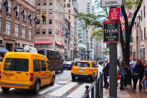 Yellow cabs and “Don’t Even Think of Parking Here” sign on a Manhattan street