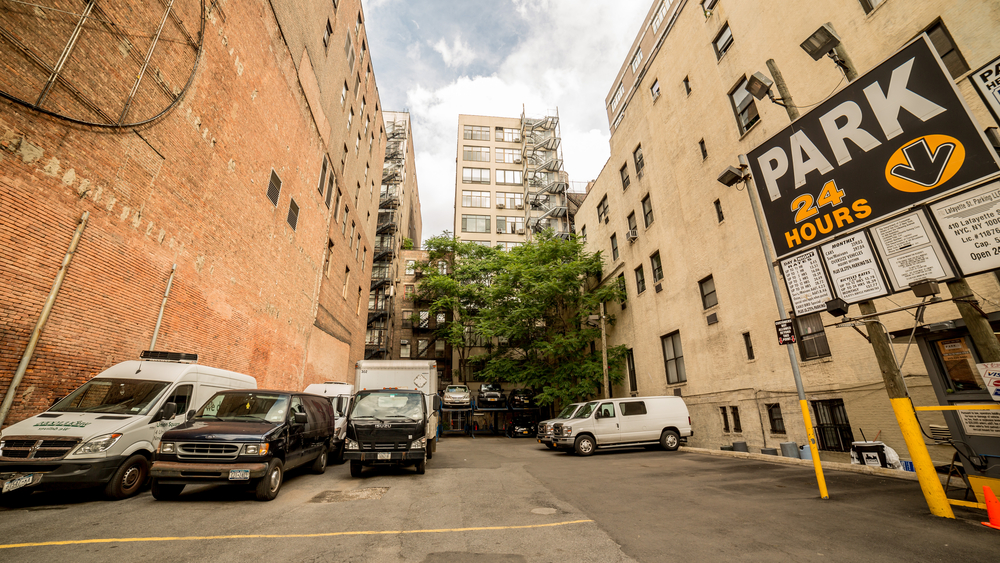 Private parking lot between residential buildings in New York City
