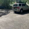 Outdoor lot parking on Appian Way in Allston