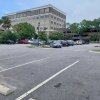 Outdoor lot parking on W Main Street in Pensacola