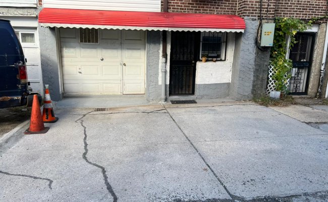 Driveway parking on 50th Avenue in Queens