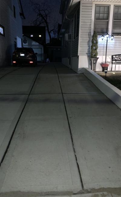 Driveway parking on St in Queens